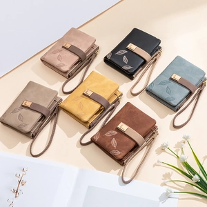 Collection of matte synthetic leather women's wristlet wallets in six stylish colors