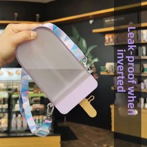 Creative popsicle-shaped water bottle with purple frosted finish and adjustable strap