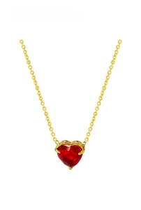Detail of red heart zircon pendant in 18k gold plated claw setting on thin chain