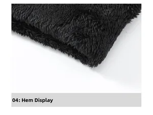 Detailed close-up of the black fleece hoodie hem showing high-density fabric texture
