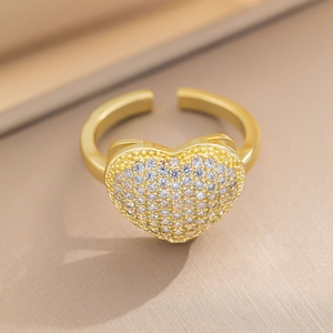 Elegant gold heart ring with pavé zircon stones on an adjustable open band for women