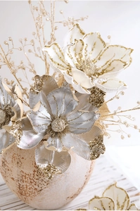 Detail of champagne gold artificial magnolia with sequins and beads for Christmas decor