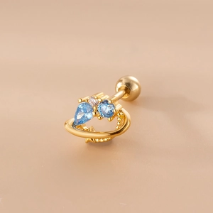 Detailed close-up of golden stainless steel stud earring featuring blue teardrop zircon