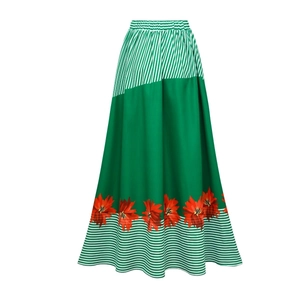 Detail of bohemian high waist maxi skirt featuring green stripes and red floral patterns