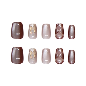 Cat eye and diamond press-on nail set with glitter checkers in brown and pink