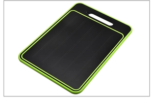 Top detail view of black aluminum alloy rapid thawing board with vibrant green edging