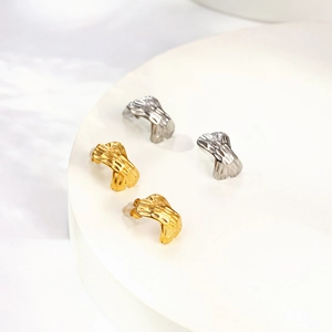 Minimalist C-shaped geometric earrings with rippled texture in gold and silver finish
