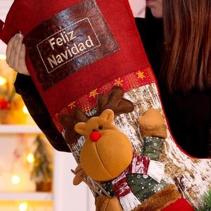 Large red Christmas stocking with 3D reindeer doll and Feliz Navidad leather patch