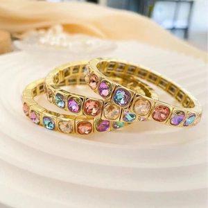 Set of three luxury gold-plated bangles with square macaron-colored crystals for women