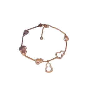 Rose gold hollow wulu gourd bracelet with zircon and red agate charms for women