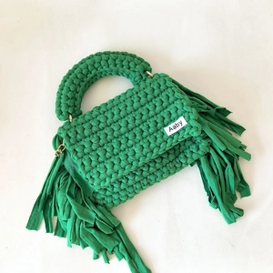 Handmade emerald green crochet shoulder bag with stylish fringe tassels and top handle