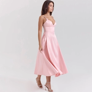 Detailed side view of a glossy pink V-neck satin A-line dress with spaghetti straps