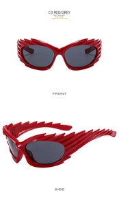 Close-up of red flame-shaped sunglasses with grey lenses showing front and side views
