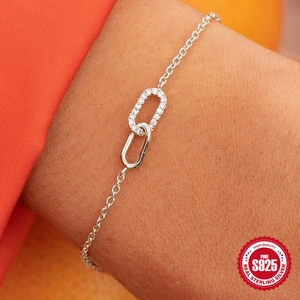 Elegant S925 sterling silver interlocking double loop bracelet with sparkling zircon stones