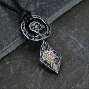 Vintage Nordic totem pendant in antique silver and gold finish on a black rope necklace