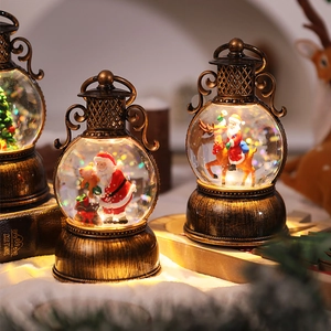 Detail of vintage Christmas lanterns with warm LED lighting and bronze metallic finish
