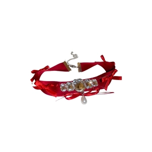 Elegant red velvet choker with crystal accents and teardrop pearl pendant necklace
