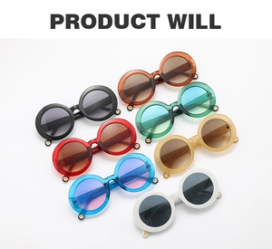 Flat lay of colorful round frame sunglasses showing diverse lens tints and frame colors