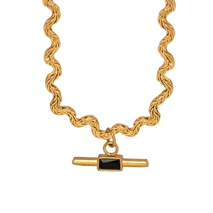 French style wave chain necklace featuring a vintage gold bar pendant with black stone