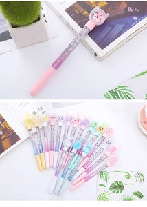 Detail of liquid glitter pens featuring colorful sequins and cute pastel cartoon toppers