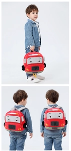 Detailed view of plush red fire truck backpack with adjustable straps and soft texture