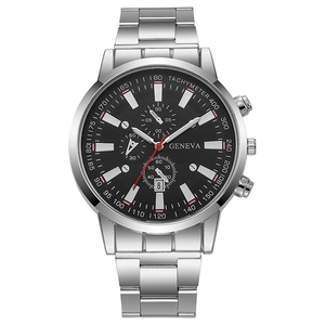 Detailed macro view of silver steel watch with black dial and calendar display