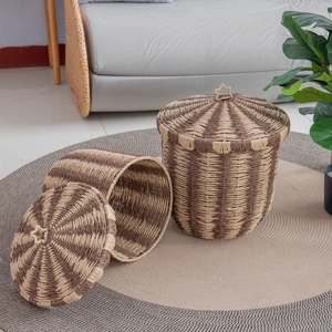 Nordic handmade woven storage baskets with star-handle lids in natural fiber stripes