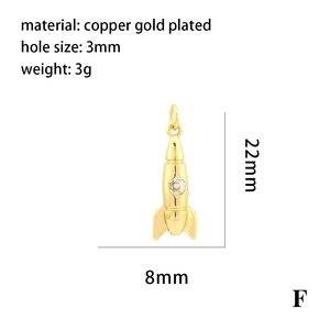 Detailed size chart of gold-plated rocket charm with micro-pave evil eye stone and 3mm hole