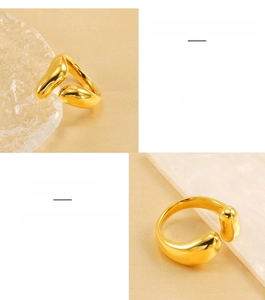 Detailed view of the 18K gold-plated adjustable open ring with a smooth organic shape