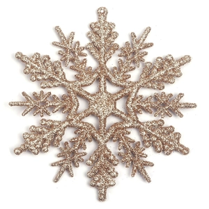 Detail of a 10cm gold glitter snowflake ornament for Christmas tree and wreath decoration