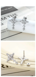 Detailed view of silver cross stud earrings with micro-set cubic zirconia and back stud