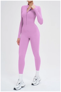 Detail of lavender yoga jumpsuit featuring a half-zip neckline and high-elastic fabric