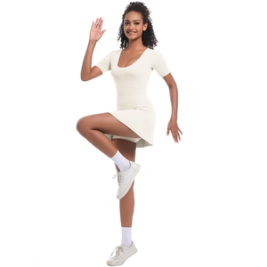 Macro detail of elastic ivory athletic dress with built-in shorts for tennis and golf