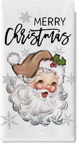 Detail of Christmas dish towel featuring a retro Santa Claus print and Merry Christmas text
