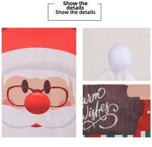 Détail de housse de chaise Père Noël avec pompon doux et motif festif Warm Wishes