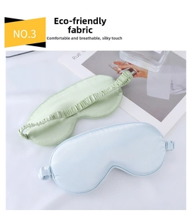 Detail of eco-friendly silk sleep masks in light blue and green with elastic straps