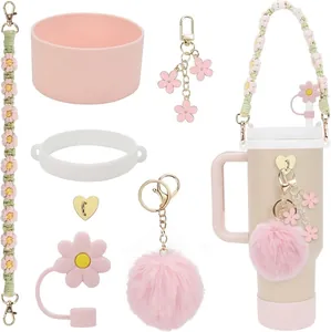 Pink floral accessory set for 40oz tumbler with straw cover and silicone boot