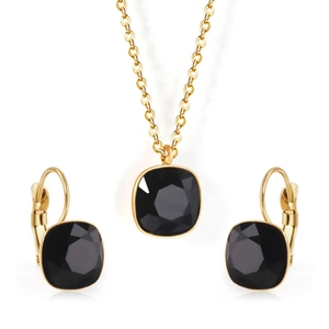 Close-up of square black zircon necklace and matching gold earrings jewelry set