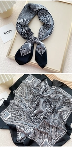 Detailed view of square satin scarf with vintage black and white paisley pattern