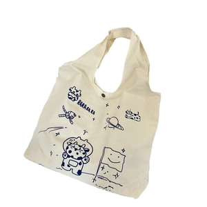 Off-white canvas shoulder bag with blue cartoon astronaut cow print and snap closure