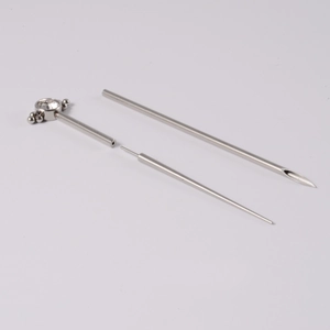 Macro view of 316L stainless steel body piercing needles and jewelry guide tools