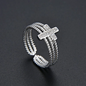 Adjustable silver multilayer cross ring with micro-paved zircons and twisted band