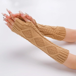 Close-up of camel knit arm warmers with diamond cable patterns and ribbed cuffs