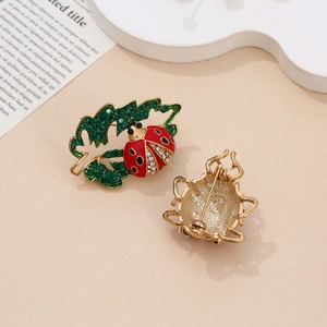 Elegant ladybug and green leaf brooch with rhinestones and alloy red enamel finish
