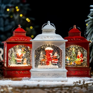 Vintage Christmas lantern water globe with Santa and reindeer scenes and swirling snow