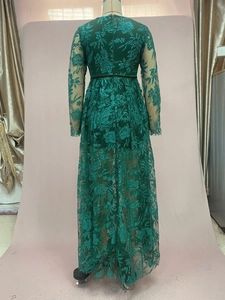Detail of green sequin lace evening gown back view with intricate floral embroidery