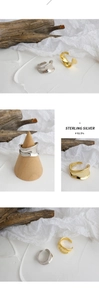 Detailed close-up showing S925 sterling silver stamp on minimalist irregular gold ring