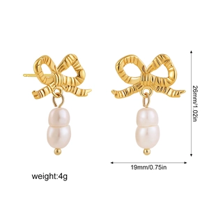18K gold bowknot earrings with baroque pearls and size dimensions shown on white background