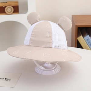 Close-up of breathable mesh sun hat for toddlers with cute 3D bear ears and chin strap