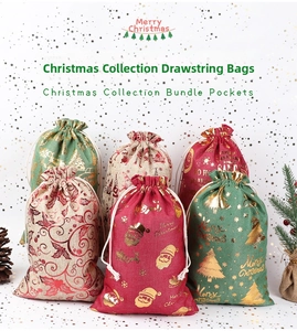 Detailed view of six festive Christmas cotton drawstring gift bags with gold foil patterns